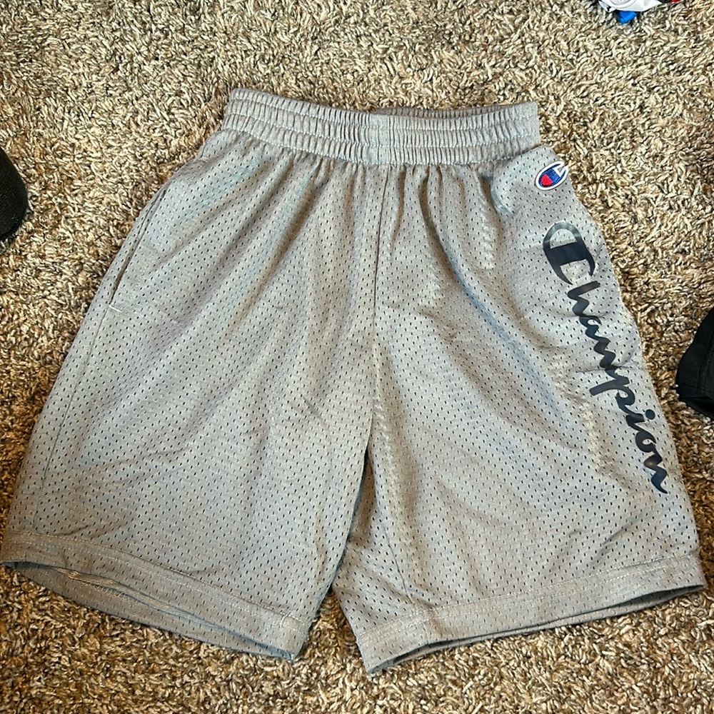7 pairs of boys size small shorts